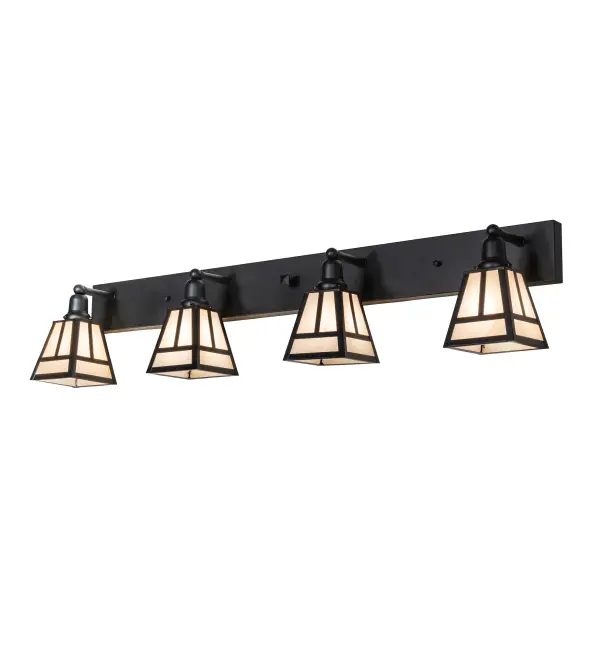 Perfect for fine interior lighting applications; the Brass T" Mission Lighting fixture features a Craftsman Signature-style lantern. The fixture features four Sahara Taupe Idalight shades that are enhanced with a Solid Brass constructed frame and hardware finished in Old Wrought Iron for durability and longevity. Perfect for illuminating fine baths and hallways in homes and hospitality locations from Biltmore; North Carolina; to Dumbarton Oaks in Washington; DC; to Montecito; California. The "T" Mission Vanity Light is included in our American-made; American-designed; handcrafted Mission Lighting Collection and manufactured in Yorkville; New York. UL and cUL listed for dry; damp and wet locations."