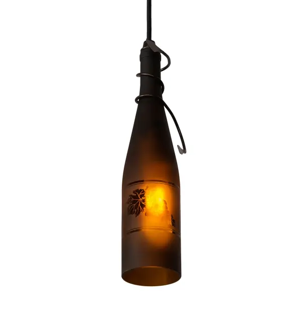 Capture the life of the party with the whimsical design of the Meyda Wine Bottle Pendant. So much fun that you may want to hang from it, but don't! Liven up a restaurant, club, or home with a pendant that does so much more than deliver light, it adds personality and pizzazz. An Amber etched wine bottle is embraced directly by a Black Cord with vine-like accents in a Mahogany Bronze finish. Perfect for illuminating bars, islands, and tables in homes, restaurants, hotels, pubs, nightclubs, wineries, and retailers, this mini pendant will be appreciated for its fine detail and charm by connoisseurs from Washingtonville, New York, to Bluemont, Virginia, to Napa Valley, California. The overall height ranges from 15 to 62 inches, as the Black cords can adjust to meet your exact lighting requirements. This rich-looking Tuscan Vineyard Wine Bottle Mini Pendant is included in our American-made, American-designed, handcrafted Wine Bottle Lighting Collection. The fixture is manufactured in Yorkville, New York. UL and cUL listed for dry and damp locations. Take your finest bottle of wine, and Meyda will transform it into an everlasting personalized fixture of light. You can also create custom lighting with beer bottles, mason jars, milk bottles, and other glass containers and vessels by contacting us! Collection: Tuscan Vineyard Finish: Mahogany Bronze Glass: Amber Wine Bottle Width: 5.00" Height: 15.00" Length: 5.00" Weight: 2.00 lb Number of Bulbs: 1 Maximum Wattage: 40.00 W Bulb Type: T10 Bulb Base: E26 Material: Steel Country of Origin: USA Safety Listing: Damp Safety Rating: Damp