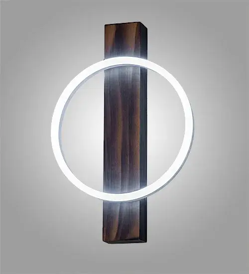 A stunning modern ring is combined with a handsome rustic look. A brilliant illuminating Statuario Idalight Halo is embraced by a Wooden backplate with a Satin Wood finish. Integral LEDs deliver energy efficient illumination and long lamp life. Custom crafted by highly skilled artisans in our 180;000 sq ft manufacturing facility in Yorkville; NY at the foothills of the Adirondack Mountains. Customize fixture sizes; metal finishes and diffuser colors to your tastes. UL and cUL listed for dry and damp locations. - alternate view