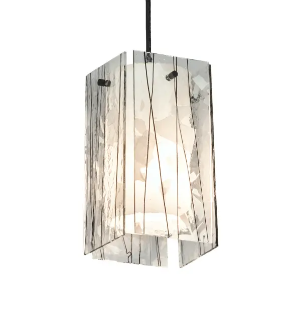 Bare trees against a winter sky inspired the Branches Quadrato mini pendant. Clear Textured Glass is drizzled and fused with a Textured Black Branch-like design. The interior features a Statuario Idaight cylinder that illuminates from within. The overall height ranges from 11 to 70 inches; as the Black Cord can be easily adjusted in the field. The Metro Fusion Branches Quadrato Mini Pendant is included in our American-made; American-designed; handcrafted Abstract Lighting Collection and manufactured in Yorkville; New York. UL and cUL listed for dry and damp locations.