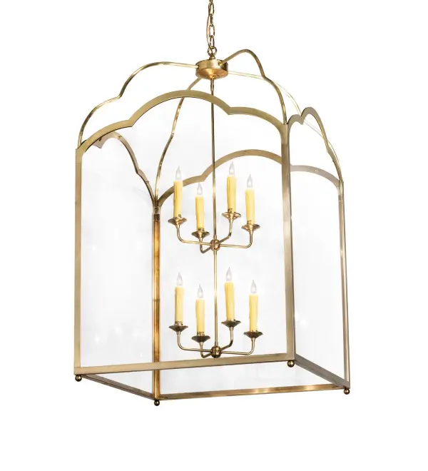 This architecturally styled Solid Brass fixture is designed with a unique and stylish pizazz. The elaborate geometric structure features a stunning Raw Brass finish. The pendant is created with a Crystal Idalight Lens that reveals eight Ivory faux candlelights perched on bobeches that generate beautiful ambient illumination. The overall height ranges from 57 to 128 inches, as the chain length can be adjusted to accommodate your specific lighting application needs. The pendant is ideal for placement in foyers, ballrooms, and lobbies in residential, hospitality, and commercial spaces, and it is perfect for homes, hotels, and restaurants from New York, to Salt Lake City, Utah, to Los Angeles. The Claudette Pendant is included in our American-made, American-designed, handcrafted Transitional Lighting Collection and manufactured in Yorkville, New York. UL and cUL listed for dry and damp locations and featured in the Dunwoody Country Club in Atlanta, Georgia. Collection: Claudette Finish: Raw Brass Glass: Crystal Idalight Width: 32.00" Height: 57.00" Length: 32.00" Weight: 66.00 lb Number of Bulbs: 8 Maximum Wattage: 60.00 W Bulb Type: BA9 Bulb Base: E12 Material: Brass Country of Origin: USA Safety Listing: Damp Safety Rating: Damp