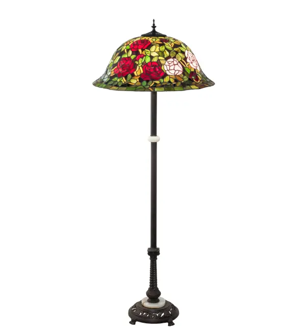 The most beloved of all floral beauties. The Rosebush is beautifully represented in this stunning reproduction of a Tiffany Studio Classic. Petal Pink, Romantic Red and Beautiful Blue art glass Roses ramble on a maze of Garden Green leaves. The shade is created using the famous Meyda Tiffany copperfoil construction. The delicate domed stained glass shade is paired with a Mahogany Bronze finished floor base. UL and cUL listed for dry locations. Collection: Tiffany Rosebush Finish: Mahogany Bronze Glass: Stained Glass Width: 24.00" Height: 62.00" Length: 24.00" Weight: 25.00 lb Number of Bulbs: 3 Maximum Wattage: 60.00 W Bulb Type: A19 Bulb Base: E26 Material: Zinc/Steel Country of Origin: CHINA Safety Listing: Damp Safety Rating: Dry