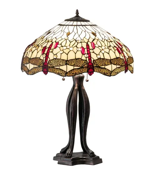 This beloved lighting design is modeled after the original Hanginghead Dragonfly from Tiffany Studios. Diving Red Dragonflies with glowing jeweled eyes and delicate metal filigree wings circle over hand-cut pieces of Beige art glass that represent sunny skies. This lovely shade is created using the famous Meyda Tiffany copperfoil construction and enhanced with an elegant Mahogany Bronze finished cast metal base. Install the lamps to illuminate picture windows, desks, and tables in Buffalo, New York, Houston, Texas, and Fremont, California. The Tiffany Hanginghead Dragonfly Table Lamp is included in our Tiffany Reproduction Collection. UL and cUL listed for dry locations. Collection: Tiffany Hanginghead Dragonfly Finish: Mahogany Bronze Glass: Ba Fl Width: 22.00" Height: 30.00" Length: 22.00" Weight: 19.00 lb Number of Bulbs: 3 Maximum Wattage: 60.00 W Bulb Type: A19 Bulb Base: E26 Material: Zinc/Steel Country of Origin: CHINA Safety Listing: Damp Safety Rating: Dry - alternate view