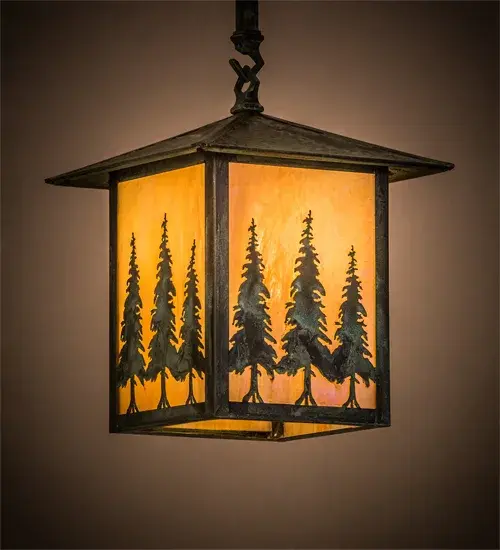 Mesmerizing Tall Pine Tree silhouettes stand tall as the brilliant morning sun rises in the background. Beautiful ambient light is projected through a stunning Beige Iridescent Glass diffuser which is complemented with a Solid Brass frame; decorative accents; and hardware featured in a Verdigris finish. This Craftsman Signature lantern is ideal for illuminating dining tables; islands; and covered porches or decks. Handcrafted by expert artisans in our manufacturing facility at the foothills of the spectacular Adirondack Mountains; the nature-inspired pendant is available in custom designs; sizes; and styles. Energy efficient lamping options such as LED are available. The fixture is UL and cUL listed for dry; damp and wet locations.
