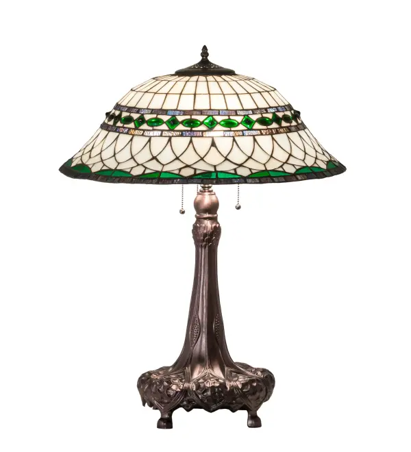 Emerald-colored glass jewels and Multi colored granite glass accent this handsome Amber Beige art glass reproduction of a famous Louis Comfort Tiffany design. Our Tiffany Roman shade is inspired by Italian art and architecture and handcrafted of authentic stained glass using the famous Meyda Tiffany copperfoil construction method. Every art glass lamp is a unique handcrafted work of art. Natural variations in the glass colors make every item a masterpiece of its own. The table lamp base is finished in a hand applied Mahogany Bronze.