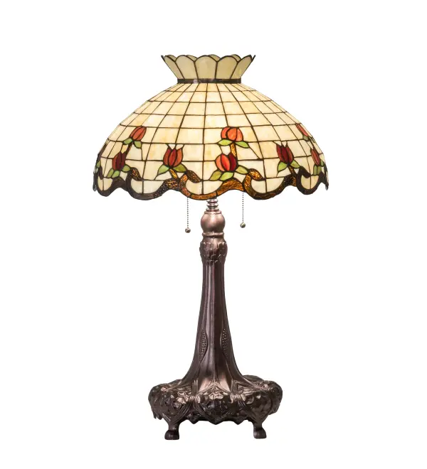 Grace your home with the elegant Roseborder Table Lamp. This lamp features an exquisitely crowned shade featuring a gridwork of Beige art glass adorned with a Bark Brown Granite Glass border of swirling ribbons and perfect Red Rosebuds with Green Leaf accents. The shade is made of hand-cut art glass using the famous Meyda Tiffany copperfoil construction process and embraced by a lamp base finished in Mahogany Bronze. The Roseborder Table Lamp is featured in our American-designed, handcrafted Stained Glass Lighting Collection. UL and cUL listed for dry locations. Each shade is a unique work of art with color variations based on natural ingredients inherent in the glass. Contact us if color matching is critical when ordering multiple items. Collection: Roseborder Finish: Mahogany Bronze Glass: Ba Br 59 Xag Width: 20.00" Height: 33.00" Length: 20.00" Weight: 14.50 lb Number of Bulbs: 3 Maximum Wattage: 60.00 W Bulb Type: A19 Bulb Base: E26 Material: Steel/Zinc Country of Origin: CHINA Safety Rating: Dry
