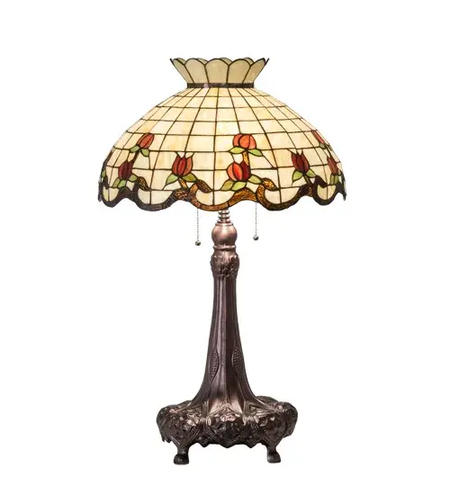 Grace your home with the elegant Roseborder Table Lamp. This lamp features an exquisitely crowned shade featuring a gridwork of Beige art glass adorned with a Bark Brown Granite Glass border of swirling ribbons and perfect Red Rosebuds with Green Leaf accents. The shade is made of hand-cut art glass using the famous Meyda Tiffany copperfoil construction process and embraced by a lamp base finished in Mahogany Bronze. The Roseborder Table Lamp is featured in our American-designed, handcrafted Stained Glass Lighting Collection. UL and cUL listed for dry locations. Each shade is a unique work of art with color variations based on natural ingredients inherent in the glass. Contact us if color matching is critical when ordering multiple items. Collection: Roseborder Finish: Mahogany Bronze Glass: Ba Br 59 Xag Width: 20.00" Height: 33.00" Length: 20.00" Weight: 14.50 lb Number of Bulbs: 3 Maximum Wattage: 60.00 W Bulb Type: A19 Bulb Base: E26 Material: Steel/Zinc Country of Origin: CHINA Safety Rating: Dry - alternate view