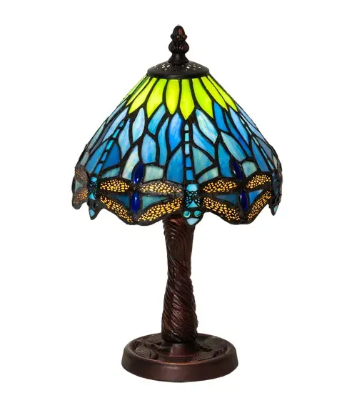 This version of a most beloved stained glass dragonfly design from Tiffany Studios is modeled after the original. Diving Blue Dragonflies with glowing jeweled eyes and delicate Amber metal filigree wings circle over hand cut and copper foiled pieces of Lakeside Blue and Pond Green glass that represent rippling water. The shade is accented with Blue jewels and complemented with a handsome Mahogany Bronze finished base. This lovely shade is created using the famous Meyda Tiffany copperfoil construction. Each shade is a unique work of art with color variations based on natural ingredients inherent in the glass. Contact us if color matching is critical when ordering multiple items. - alternate view
