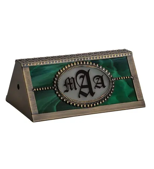 A stunning Brass Banker's Lamp shade is personalized with the monogram MAA in a Red hue on a Clear glass background with matching Brass filigree. The shade features Beige art glass and is complemented with an Antique Brass finished frame. The Personalized MAA Banker's Lamp is included in our American-made; American-designed; handcrafted Personalized Banker's Lamp Collection and manufactured in Yorkville; New York. This specific lamp shade can be ordered; and we will coordinate the custom logo with you to suit your project. Call For Lead Time and Pricing. - alternate view