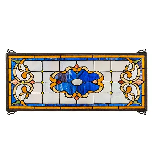 Madison is a stunning Art Nouveau design in its regal glamor and beauty with Clear Iridescent; Blue; Beige; and Amber stained glass. This exquisite piece can be used as a transom window for placement above or adjacent to a door or window; or other areas of a home or business. The window is created using the famous Meyda Tiffany copperfoil construction technique and includes chains and Brass mounting brackets. The Madison Transom Stained Glass Window is included in our American-designed; handcrafted Stained Glass Window Collection. Each shade is a unique work of art with color variations based on natural ingredients inherent in the glass.