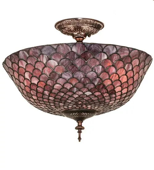 A Louis Comfort Tiffany studio classic... The renowned Fishscale design features a variegated Tortoiseshell of Emerald; Sapphire; Mauve; and Beige colored art glass; evoking a unique dimensional and textured look in a rainbow of brilliant hues. This exquisite art glass shade is created using the famous Meyda Tiffany copperfoil construction process and enhanced with a Mahogany Bronze finish. Inspired by Rainbow Trout and other colorful fish found in Northwest Montana; Eastern Idaho; and Baja; California. The ceiling fixture can perfectly illuminate living and dining spaces in residential and hospitality settings. The Tiffany Fishscale Flushmount is included in our American-designed Tiffany Reproduction Lighting Collection. UL and cUL listed for dry and damp locations. Each shade is a unique work of art with color variations based on natural ingredients inherent in the glass. Custom made. Call for price and lead time. - alternate view