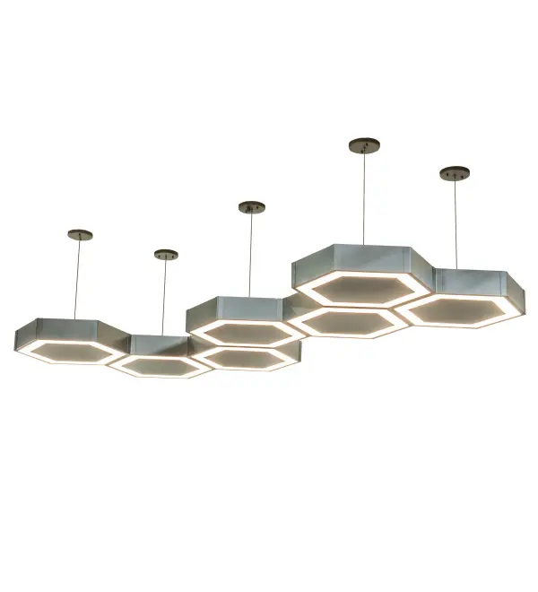 A solid modern geometric design. Like audio speakers mounted to ceilings; Arlo features 7 sturdy hexagon lighting elements in an asymmetrical array. Each finished in Nickel with a Statuario Idalight diffuser that illuminates with Integral LEDs for energy efficiency; long life and beautiful light. Ideal for lounges; restaurants and various residential; hospitality and commercial settings. Domestically produced in our 180;000 sq ft manufacturing facility in Yorkville; NY. Customize diffuser colors; metal finishes and fixture sizes to your taste. UL and cUL listed for damp and dry locations. Jefferson Pendants are featured in Hornet Commons; a modern; fully furnished purpose-built student living community at CAL State University in Sacramento.