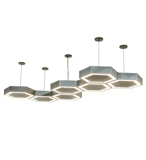 A solid modern geometric design. Like audio speakers mounted to ceilings; Arlo features 7 sturdy hexagon lighting elements in an asymmetrical array. Each finished in Nickel with a Statuario Idalight diffuser that illuminates with Integral LEDs for energy efficiency; long life and beautiful light. Ideal for lounges; restaurants and various residential; hospitality and commercial settings. Domestically produced in our 180;000 sq ft manufacturing facility in Yorkville; NY. Customize diffuser colors; metal finishes and fixture sizes to your taste. UL and cUL listed for damp and dry locations. Jefferson Pendants are featured in Hornet Commons; a modern; fully furnished purpose-built student living community at CAL State University in Sacramento. - alternate view