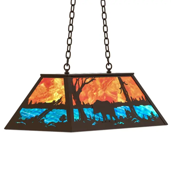 A Black Bear wanders by a lake in the woods on this nature inspired oblong pendant. Beautiful ambient illumination shines brilliantly across a Sunburst colored art glass sky above gleaming Blue-Green glass waters. Timeless Bronze finished hardware and accents complement this oblong pendant. Perfect for lighting a kitchen island, bar, billiard table, or other space. Overall height ranges from 18 to 43 inches as the chain length can be easily adjusted in the field to accommodate your specific lighting needs. Made to Order in our 180,000 sq ft facility at the foothills of the breathtaking Adirondack Mountains. Shade colors, metal finishes and pendant sizes can be customized to meet your needs. UL and cUL listed for damp and dry Locations. Collection: Bear At Lake Finish: Timeless Bronze Glass: Orange & Blue-Green Art Glass Width: 17.00" Height: 19.00" Length: 33.00" Weight: 30.00 lb Number of Bulbs: 6 Maximum Wattage: 60.00 W Bulb Type: A19 Bulb Base: E26 Country of Origin: USA Safety Rating: Damp
