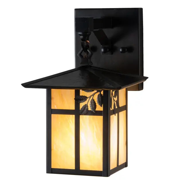 Handcrafted from Solid Brass for indoor and outdoor lighting applications. A single Branch Leaf filigree accent is highlighted on Beige Iridescent glass and complemented with a Craftsman Brown finish. This Craftsman Signature fixture is Made to Order in our 180;000 sq ft manufacturing facility in Yorkville; NY at the foothills of the Adirondack Mountains.This fully configurable Build Your Own series offers unlimited combinations of lantern styles; functions; fixture sizes and metal finishes. UL and cUL listed for dry; damp and wet locations.