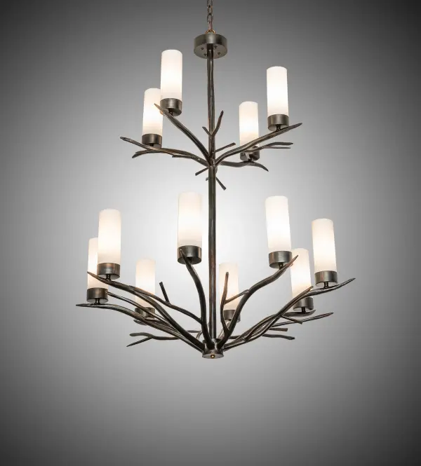 Like the branches of a tree in the cold winter woods; the Winter Solstice chandelier is an abstract expression of light. 12 Whitestone Idalight cylindrical shades are suspended from the branch-styled chandelier finished in Dark Burnished Antique Copper. Overall height ranges from 55 to 114 as the chain easily adjusts in the field. The Winter Solstice 12 Light Chandelier is included in our American-made; American-designed; handcrafted Nature Inspired Collection. Manufactured in Yorkville; New York. UL and cUL listed for dry and damp locations.