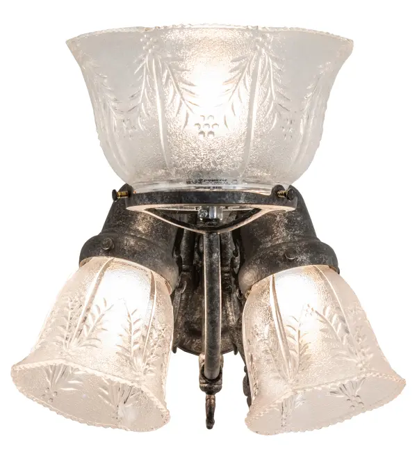 Step back in time with a traditional glass, fit, and finish. Reminiscent of lighting fixtures from the early 1900s, the Revival wall fixture features three Clear Textured Revival Glass shades with a Summer Wheat motif, offering an authentic historic look to complement any room or space. The Antique Pewter finished Brass hardware is designed and crafted with the exact details of old-world artisanship. Perfect for illuminating hallways, dining areas, and living spaces in various residential and hospitality settings, including Old Bethpage on Long Island in New York and Wilmot, Ohio. The Revival Gas & Electric Wall Sconce is offered in our American-designed, handcrafted Revival Collection. UL and cUL listed for dry and damp locations. Collection: Revival Finish: Antique Pewter Glass: Clear Textured Width: 15.00" Height: 12.00" Length: 12.50" Weight: 5.50 lb Extension from Wall: 12.50" Number of Bulbs: 3 Maximum Wattage: 40.00 W Bulb Type: A19 Bulb Base: E26 Material: Brass Country of Origin: USA Safety Rating: Damp