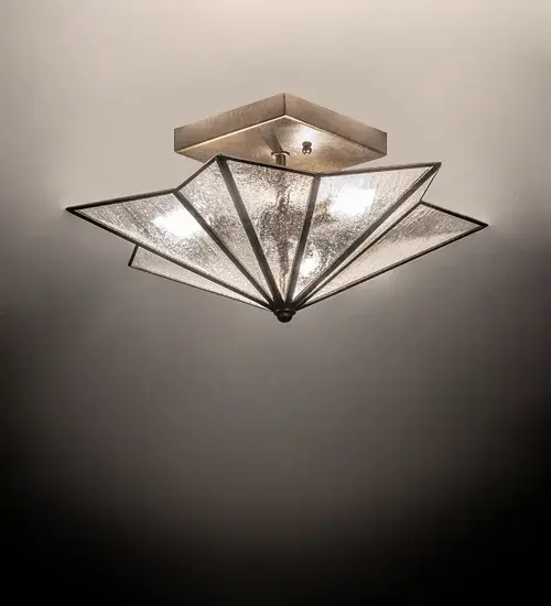 This classic Star-style fixture features Clear Seeded Glass panels; complemented by a hand-rubbed iron frame and hardware. The ceiling fixture is ideal for illuminating dining areas and hallways in fine homes and hotels. The Star Semi- Flush Mount is included in our American- made; American-designed; handcrafted Star Collection; which is manufactured in Yorkville; New York. The fixture is UL and cUL listed for dry and damp locations.