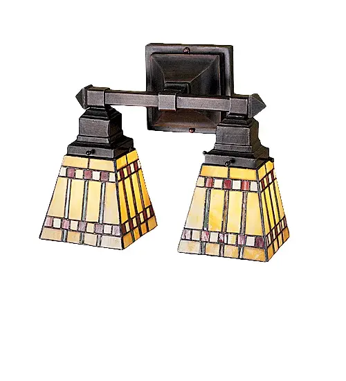 With their love of geometric forms; architects of the Prairie School interpret organic objects into simplified lines. The Meyda Tiffany Prairie Corn two light wall sconce shade has rows of Chili Red and Wheat kernels and stalks of Bronzed Jade against a Maize Gold background. The stained glass shades are paired with simple Mission style hardware in a Mahogany Bronze finish.