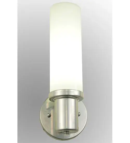 The streamlined West Chester wall sconce adds a clean; modern form to baths and other interiors. The wall luminaire diffuses light evenly through a cylinder of Opal Glass which is held in place by a steel base; finished in a complementary Extreme Chrome powdercoat finish. Handcrafted by highly skilled artisans in our manufacturing facility in Upstate New York; this fixture is available in a wide range of custom choices including various designs; colors; sizes and dimmable energy efficient lamping options such as LED. The sconce is UL and cUL listed for damp and dry locations. - alternate view