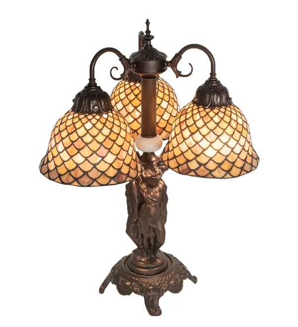 A Louis Comfort Tiffany studio classic... The renowned Fishscale design features a variegated Tortoiseshell of Emerald; Sapphire; Mauve and Beige colored art glass; evoking a unique dimensional and textured look in a rainbow of brilliant hues. This exquisite art glass shade is created using the famous Meyda Tiffany copperfoil construction process and complemented with an elegant Three Graces cast metal base finished in Mahogany Bronze. The Tiffany Fishscale Table Lamp is included in our American-designed; Tiffany Reproduction Lighting Collection. UL & cUL listed for dry locations. Each shade is a unique work of art with color variations based on natural ingredients inherent in the glass. Contact us if color matching is critical when ordering multiple items.