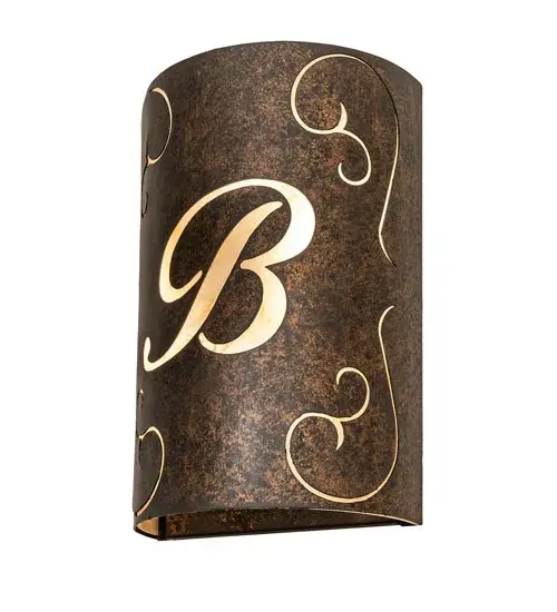 This personalized wall fixture features a Gothic Gold finished frame and a graceful scrolled design with the B Monogram that highlights with a Sahara Taupe Idalight diffuser. The Personalized B Monogram Wall Sconce is included in our Personalized Collection and is manufactured in Yorkville, New York. The fixture is UL and cUL listed for dry and damp locations. This specific wall sconce can be ordered as is or with another letter, or font of your choosing, and we will coordinate the custom logo or monogram with you to suit your project. Please call for the price and lead time. Collection: Personalized Finish: Gothic Gold Glass: Sahara Taupe Idalight Width: 10.00" Height: 15.00" Length: 5.00" Weight: 9.00 lb Extension from Wall: 5.00" Number of Bulbs: 2 Maximum Wattage: 60.00 W Bulb Type: A19 Bulb Base: E26 Material: Steel Country of Origin: USA Safety Rating: Damp - alternate view