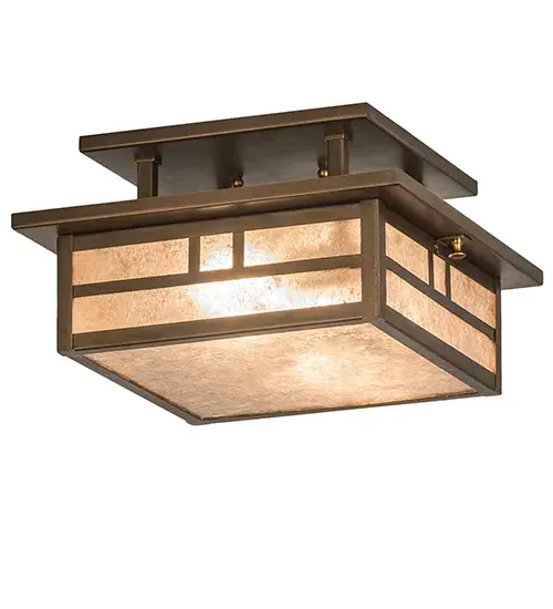 This ceiling fixture features a stunning Craftsman design statement captured with a dramatic Mission-style profile and a Double Bar straight-line design. The Silver Mica diffuser is enhanced with a frame and hardware in an Antique Copper powder coat. The ceiling fixture is ideal for illuminating corridors and entryways in timber homes, modern farmhouses, and other spaces. The Hyde Park Double Bar Mission Flush Mount is part of our American-made, American-designed, handcrafted Craftsman Signature Series, manufactured in Yorkville, New York. UL and cUL listed for dry and damp locations. Our Build Your Own Craftsman Signature Series features unlimited combinations of styles. The collection is called Build Your Own because it is fully configurable and customizable from size and design to finish and lens color. Choose from many style options, or send us your concept today! Call today to learn how to use the configuration tool on our website to get an instant item number! Collection: Hyde Park Finish: Antique Copper Glass: Silver Mica Width: 17.00" Height: 6.50" Length: 12.00" Weight: 6.00 lb Number of Bulbs: 2 Maximum Wattage: 60.00 W Bulb Type: A19 Bulb Base: E26 Material: Steel Country of Origin: USA Safety Rating: Damp - alternate view