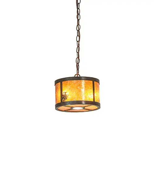 This stunning cylindrical lantern features an Amber Mica lens design; a Winter Pine motif; and is enhanced with a Dark Burnished Antique Copper finish. The pendant is perfect for illuminating islands and dining tables in timber homes; modern farmhouses; and other spaces. The fixture features two circuits: one for the two inner lights that highlight the beauty of the mica; and the second for the downlight used for functional illumination on surfaces below. The overall height ranges from 12 to 41 inches; as the chain can be easily adjusted on location. The Fulton Winter Pine Pendant is part of our American-made; American-designed; handcrafted Craftsman Collection; manufactured in Yorkville; New York. UL and cUL are listed for use in both dry and damp locations. - alternate view