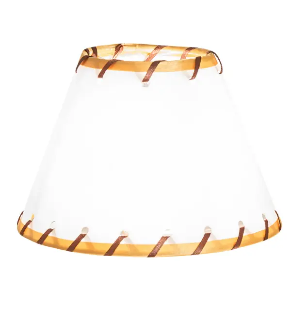 This stunning western-styled shade features an attractive Linen shade created with authentic Rawhide accents. Large ranches, from southwest Texas to northern New Mexico to southern Colorado inspire this lighting shade design. Perfect for pairing with sconces and chandeliers to create a stunning rustic aesthetic. The Rawhide Shade is included in our American-designed, handcrafted Western Lighting Collection. Collection: Faux Rawhide Finish: Mahogany Bronze Glass: Linen/Rawhide Width: 6.00" Height: 4.00" Length: 6.00" Weight: 1.00 lb Country of Origin: USA Safety Rating: Damp