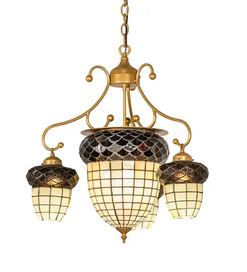 Inspired by the hues and textures of the mighty Oak Tree... This chandelier features an art glass shade in Multi-toned Autumn Beige and crowned with a scalloped trim in Bark Brown Granite Glass. The shade is created using the famous Meyda Tiffany copperfoil construction and complemented with elaborate hardware in a stunning Goldtastic finish. Overall height ranges from 30 to 97 inches as the chain can be easily adjusted in the field. The Acorn Chandelier is included in our American manufactured; American designed; handcrafted Nature Inspired Collection. UL and cUL listed for dry and damp locations. No two art glass shades will be the same as their individuality can be as remarkably unique as their personality. - alternate view