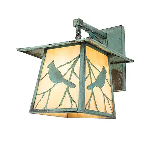 You can almost hear this singing bird's beautiful melodies echoing Mother Nature's rhythms. Delicately etched of Solid Brass; stunning silhouettes of a Song Bird perched on branches accent this charming lantern-style wall sconce. Perfect for indoor and outdoor lighting applications. The beautiful wall fixture is finished in Verdigris and features a Beige Iridescent Glass diffuser. The Stillwater Song Bird Wall Sconce is included in our American-made; American designed handcrafted Craftsman Signature Lighting Collection. Manufactured in Yorkville; New York. UL and cUL listed for dry; damp; and wet locations. Our Build Your Own Craftsman Signature Series features unlimited combinations of styles; functions; sizes; and finishes. Options include lanterns; pier and post mounts; and deck lights crafted of marine-grade materials like brass and copper with timeless living finishes offered to endure harsh climates. - alternate view