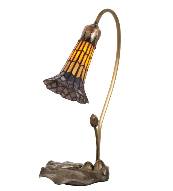 Inspired by Tiffany's famous Pond Lily design from the early 1900s... This mini lamp is created with Honey and Purple art glass using the famous Meyda Tiffany copperfoil construction. The Pond Lily shade is embraced by an elegant cast base finished by hand in Antique Brass. The Pond Lily Mini Lamp is featured in our American designed, handcrafted Stained Glass Lighting Collection. UL and cUL listed for dry locations. Each shade is a unique work of art with color variations based on natural ingredients inherent in the glass. Contact us if color matching is critical when ordering multiple items. Collection: Stained Glass Pond Lily Finish: Mahogany Bronze Glass: Honey Wispy & Purple Width: 8.00" Height: 16.00" Length: 8.00" Weight: 3.00 lb Maximum Wattage: 40.00 W Bulb Type: B10 Bulb Base: E12 Material: Steel Country of Origin: CHINA Safety Rating: Dry