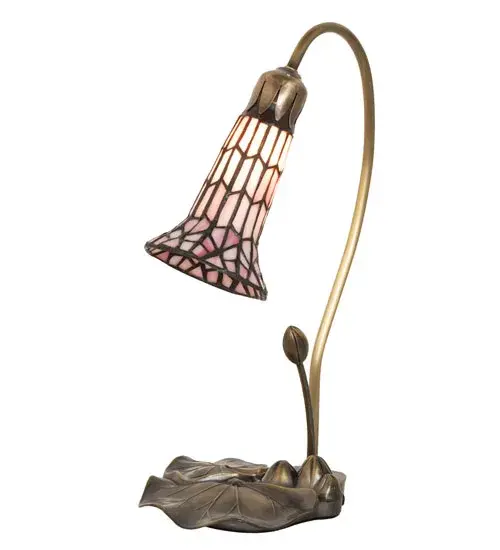 Inspired by Tiffany's famous Pond Lily design from the early 1900s... This mini lamp features a stunning Pink and White stained glass shade created using the famous Meyda Tiffany copperfoil construction process. The Pond Lily shade is embraced by an elegant Cast Base hand finished in Antique Brass. The Pond Lily Table Lamp is featured in our American designed, handcrafted Stained Glass Lighting Collection. UL and cUL listed for dry locations. Each shade is a unique work of art with color variations based on natural ingredients inherent in the glass. Contact us if color matching is critical when ordering multiple items. Collection: Stained Glass Pond Lily Finish: Mahogany Bronze Glass: Pink/White Width: 8.00" Height: 16.00" Length: 8.00" Weight: 3.00 lb Maximum Wattage: 60.00 W Bulb Type: B10 Bulb Base: E12 Material: Zinc Country of Origin: CHINA Safety Rating: Dry - alternate view