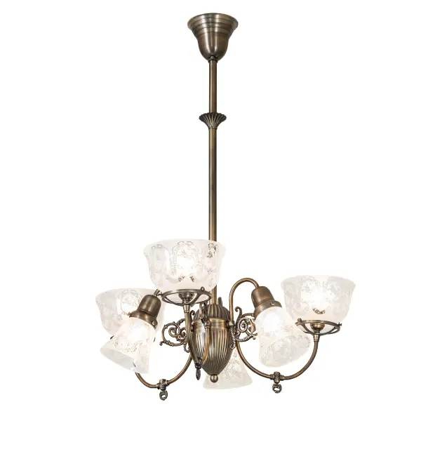Reminiscent of lighting fixtures from the early 1900s. The Revival Gas & Electric Chandelier features four Clear Etched Glass shades with an elegant Wreath and Garland motif- three facing upward and three directed downward. An authentic historic look to complement any room or space. Antique Brass hardware and decorative accents make this piece a timeless treasure. The Gas & Electric Chandelier is included in our American-designed; handcrafted Revival Lighting Collection. UL and cUL listed for dry and damp locations.