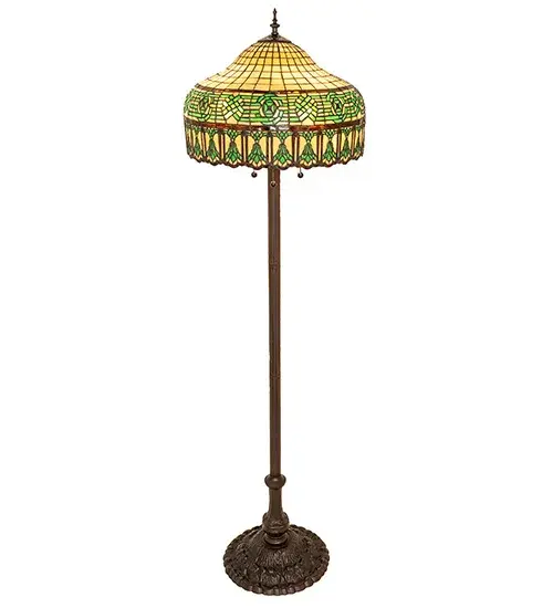 A stunning decorative lighting design inspired by classic motifs from the early 1900s. Bark Brown Flowers outline the perimeter of this art glass shade; which features matching borders and medallions; as well as Green trim above and below the floral motif; and is crowned with a Beige gridwork background. The shade is created using the famous Meyda Tiffany copperfoil construction technique and embraced by an elegant cast floor base finished by hand in Mahogany Bronze. The Gorham Floor Lamp is featured in our American-designed; handcrafted Stained Glass Lighting Collection. UL and cUL listed for dry locations. Each shade is a unique work of art with color variations based on natural ingredients inherent in the glass. - alternate view