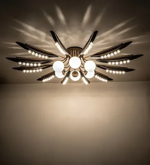 Meyda Lighting proudly announces the Anahata Chandelier for Nashville's Cumberland on Church as the "Best Project of the Season Award; Spring 2023." Like a 12-petal flower; this massive lighting design is inspired by a concept related to balance; compassion; empathy; and serenity. Petal-shaped arms with an Ebony stained wood and Gold Metallic finishes adorn this chandelier. The interior hub embraces six large LED globes while 72 round Edison-styled lamps attached to the wood with Statuario Idalight arms deliver beautiful ambient illumination. Ideal for placement in the entryway of the lobby of a multifamily building or the ballroom of a fine hotel. The Anahata 78 Light Chandelier is featured in our American-made; American-designed; handmade Art Deco Lighting Collection and manufactured in Yorkville; NY. UL and cUL listed for dry and damp locations. The Anahata Chandelier is featured in Cumberland on Church; which used to be the Tennessee Theatre and is one of the oldest apartment complexes in downtown Nashville. Project by the Anderson Design Studio in Nashville.
