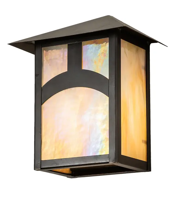 Custom-made from Solid Brass; this wall sconce is constructed for interior and exterior applications. A stunning Craftsman Signature Seneca design statement is captured with a dramatic Mission-styled profile and an abstract Hilltop design. The wall sconce is ideal for illuminating timber homes; modern farmhouses; and other spaces from Traverse City; Michigan; to Lake Tahoe; Nevada; to Lake Geneva; Wisconsin. The Beige Iridescent art glass diffuser is enhanced with a frame and hardware featured in a Craftsman Brown finish. The Seneca Hill Top Wall Sconce is included in our American-made; American-Designed; handcrafted Craftsman Signature Series and manufactured in Yorkville; New York. UL and cUL listed for dry; damp; and wet locations. Our Build Your Own Craftsmans Signature Series features unlimited combinations of styles; functions; sizes; and finishes. Options include lanterns; pier and post mounts; and deck lights crafted of marine-grade materials like brass and copper with timeless living finishes offered to endure harsh climates.
