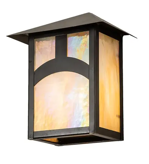 Custom-made from Solid Brass; this wall sconce is constructed for interior and exterior applications. A stunning Craftsman Signature Seneca design statement is captured with a dramatic Mission-styled profile and an abstract Hilltop design. The wall sconce is ideal for illuminating timber homes; modern farmhouses; and other spaces from Traverse City; Michigan; to Lake Tahoe; Nevada; to Lake Geneva; Wisconsin. The Beige Iridescent art glass diffuser is enhanced with a frame and hardware featured in a Craftsman Brown finish. The Seneca Hill Top Wall Sconce is included in our American-made; American-Designed; handcrafted Craftsman Signature Series and manufactured in Yorkville; New York. UL and cUL listed for dry; damp; and wet locations. Our Build Your Own Craftsmans Signature Series features unlimited combinations of styles; functions; sizes; and finishes. Options include lanterns; pier and post mounts; and deck lights crafted of marine-grade materials like brass and copper with timeless living finishes offered to endure harsh climates. - alternate view