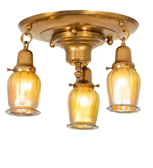 Recreating Tiffany's famous Favrile Lily design from the early 1900s... This Brass ceiling fixture is created with three mouth blown shades featuring Gold Iridescent Glass. The Squash Blossom styled shades are embraced by elegant cast hardware featuring a Brushed Brass finish. The Revival Favrile 3 Light Flushmount is featured in our American made; American designed; handcrafted Favrile Lighting Collection. Manufactured in Yorkville; NY. UL and cUL listed for dry and damp locations. Each shade is a unique work of art with color variations based on natural ingredients inherent in the glass. Contact us if color matching is critical when ordering multiple items. - alternate view