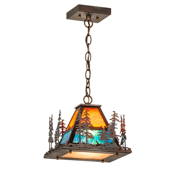 On the edge of this beautiful pendant is a stunning stand of Tall Pine trees overlooking the warm, brilliant sun shining in the sunset sky in a Sunburst colored art glass. The fixture is complemented with Blue-Green art glass, defining the woodland lake with waves of shimmering light. The ceiling pendant is enhanced with a Silver Mica bottom diffuser and decorative accents and a frame featured in a Dark Burnished Antique Copper finish. It is ideal for illuminating tables, bars, counters, and kitchen islands. The Tall Pines Pendant is featured in our American-made, American-designed Nature Inspired Lighting Collection and is manufactured in Yorkville, NY. UL and cUL listed for dry and damp locations. Upstate New York's adventurous playland, known as the Adirondack Mountains, with its many breathtaking forests, lakes, and rivers, is the spiritual birthplace of Meyda and inspires our rustic-themed art glass collections. Collection: Tall Pines Finish: Dark Burnished Antique Copper Glass: Orange And Blue/Green Art Glas Width: 14.00" Height: 13.00" Length: 10.00" Weight: 10.00 lb Number of Bulbs: 1 Maximum Wattage: 60.00 W Bulb Type: A19 Bulb Base: E26 Material: Steel Country of Origin: USA Safety Rating: Damp