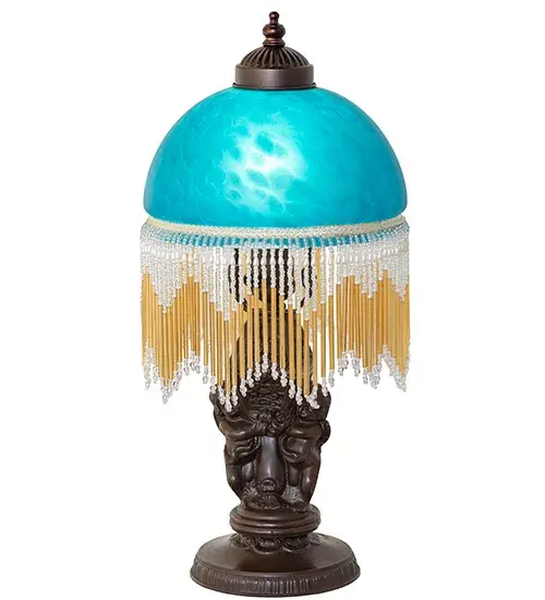 A charming nostalgic mini lamp that doubles as a decorative accent for nearly any room. This Roussillon Mini Lamp features a stunning Teal Mottled Glass shade color coordinated with delicate color-coordinated glass beaded fringe. This Victorian-inspired shade is combined with a beautifully detailed lamp base in a Mahogany Bronze finish. The Roussillon Mini Lamp is featured in our American-designed, handcrafted Victorian Lighting Collection. UL and cUL listed for dry locations. Each shade is a unique work of art with color variations based on natural ingredients inherent in the glass. Contact us if color matching is critical when ordering multiple items. Collection: Roussillon Finish: Mahogany Bronze Glass: Teal Dappled Glass Width: 8.00" Height: 17.00" Length: 8.00" Weight: 4.00 lb Number of Bulbs: 1 Maximum Wattage: 60.00 W Bulb Type: A19 Bulb Base: E26 Material: Zinc Country of Origin: CHINA Safety Rating: Dry - alternate view