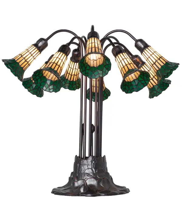 Inspired by the famous Tiffany design from the early 1900s. This table lamp features 10 stunning Honey and Red stained glass shades created using the famous Meyda Tiffany copperfoil construction technique. An elegant cast metal Lily pad base embraces the shades with fitters finished by hand in Mahogany Bronze. The Tiffany Pond Lily 10 Light Table Lamp is included in our American-designed, handcrafted Stained Glass Lighting Collection. UL and cUL listed for dry locations. Each shade is a unique work of art with color variations based on natural ingredients inherent in the glass. Please contact us if color matching is critical when ordering multiple items. Collection: Stained Glass Pond Lily Finish: Mahogany Bronze Glass: Honey Wispy/Kelly Green Width: 25.00" Height: 24.00" Length: 25.00" Weight: 19.00 lb Number of Bulbs: 10 Maximum Wattage: 25.00 W Bulb Type: B10 Bulb Base: E12 Material: Zinc Country of Origin: CHINA Safety Rating: Dry