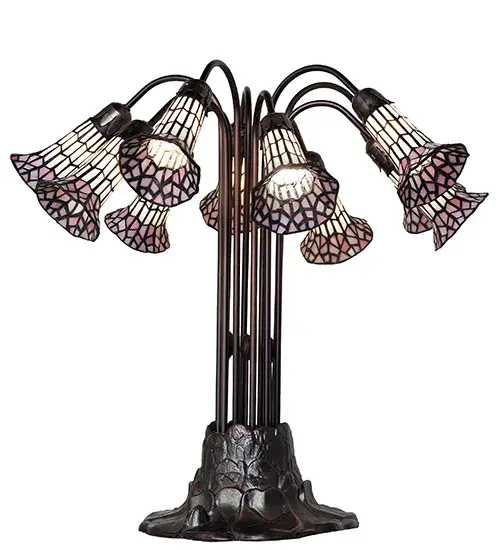 Inspired by the famous Tiffany design from the early 1900s. This table lamp features 10 stunning Pink and White stained glass shades created using the famous Meyda Tiffany copperfoil construction technique. An elegant cast metal Lily pad base embraces the shades with fitters finished by hand in Mahogany Bronze. The Tiffany Pond Lily Light Table Lamp is included in our American-designed, handcrafted Stained Glass Lighting Collection. UL and cUL listed for dry locations. Each shade is a unique work of art with color variations based on natural ingredients inherent in the glass. Please contact us if color matching is critical when ordering multiple items. Collection: Stained Glass Pond Lily Finish: Mahogany Bronze Glass: Pink/White Width: 25.00" Height: 24.00" Length: 25.00" Weight: 17.00 lb Number of Bulbs: 10 Maximum Wattage: 25.00 W Bulb Type: B10 Bulb Base: E12 Material: Zinc Country of Origin: CHINA Safety Rating: Dry - alternate view