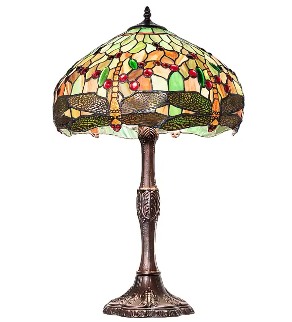 Recreating Tiffany Studio's most beloved stained glass design, the stunning shade is modeled after the original hanging-head dragonfly design. Diving dragonflies with glowing Scarlet jeweled eyes and delicate metal filigree wings circle over hand-cut and copper foiled pieces of Amber, Pond Green and Scarlet art glass, and glistening jewels of Amber, Emerald, and Scarlet that represent sunset reflections on rippling water. The elegant cast metal lamp base is finished in a warm hand-applied Mahogany Bronze.The lamp is ideal as an illuminating accent piece on credenzas, occasional tables, and other spaces in residential and hospitality settings. Inspired by dragonflies found in marshes and ponds throughout the US, from the Florida Panhandle and Everglades, to southeast Wisconsin, to the Alaska wetlands. The Tiffany Dragonfly Table Lamp is included in our American-designed Tiffany Reproduction Lighting Collection. UL and cUL listed for dry locations. Each shade is a unique work of art with color variations based on natural ingredients inherent in the glass. Please get in touch with us if color matching is critical when ordering multiple items. Collection: Tiffany Hanginghead Dragonfly Finish: Mahogany Bronze Glass: Stained Glass Width: 16.00" Height: 26.00" Length: 16.00" Weight: 10.50 lb Number of Bulbs: 3 Maximum Wattage: 60.00 W Bulb Type: A19 Bulb Base: E26 Material: Steel Country of Origin: CHINA Safety Rating: Dry