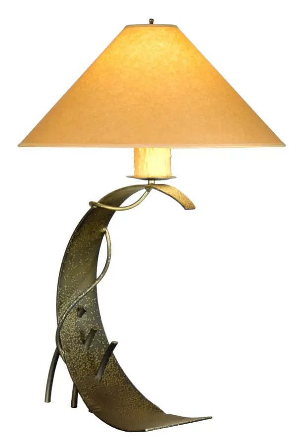 A cool crescent shaped base with unique steel decorative accents embrace an amber faux candlelight on a bobeche. The base and decorative accents are featured in a Tarnished Copper finish and crowned with a Tan Paper shade. Built and designed in the USA, this lamp is available in custom colors, sizes and finishes, and with dimmable energy efficient lamping options. UL and cUL listed for dry locations. Collection: Tara Finish: Tarnished Copper Glass: Tan Notes: Custom Crafted In Yorkville, New York Please Allow 30 Days Width: 21.00" Height: 32.00" Length: 32.00" Weight: 11.50 lb Extension from Wall: 32.00" Number of Bulbs: 1 Maximum Wattage: 60.00 W Bulb Type: A19 Bulb Base: E26 Material: Steel Country of Origin: CHINA Safety Listing: Damp Safety Rating: Damp