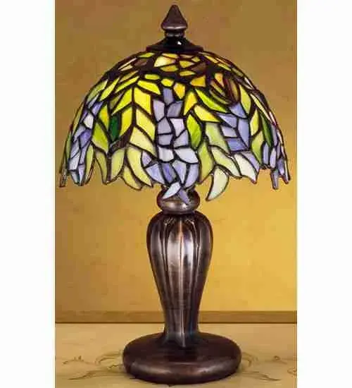 Every Meyda Tiffany item is a unique handcrafted work of art. Natural variations in the wide array of materials that we use to create each Meyda product make every item a masterpiece of its own. Photographs are a general representation of the product. Colors and designs will vary. Collection: Seneca Finish: Mahogany Bronze Glass: Amber Mica Width: 4.25" Height: 7.50" Length: 4.25" Weight: 2.00 lb Number of Bulbs: 1 Maximum Wattage: 40.00 W Bulb Type: G16.5 Bulb Base: E12 Material: Zinc Country of Origin: CHINA Safety Listing: Dry Safety Rating: Dry