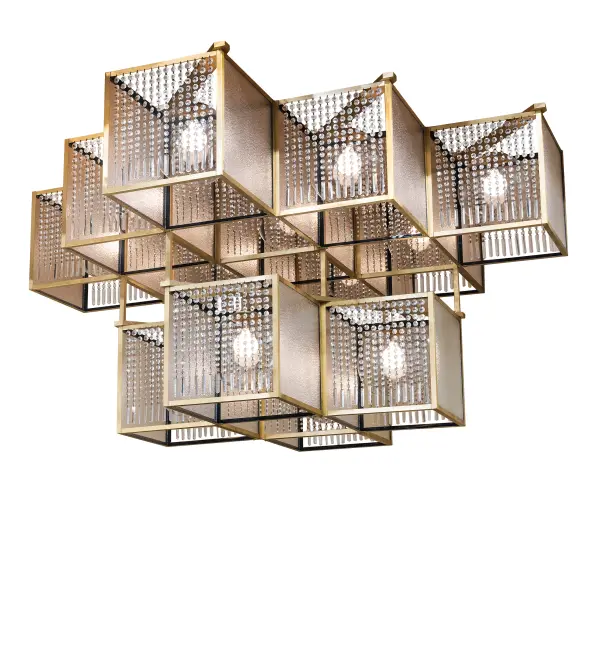 A spectacular masterpiece of Brass; Crystal; Glass; and Idalight that speaks to drama; excitement; and celebration of beautiful lighting and design. This innovative geometric-styled chandelier features thirteen cube-like elements hand-finished in stunning Brushed Brass and accented with delicate Crystal beads. Each metal frame features a Granite Glass Lens that reveals a Clear Acrylic globe. This massive chandelier is ideal for illuminating entryways; lobbies; and ballrooms in hotels and other commercial lighting installations. The Blackburn Chandelier is included in our American-made; American-designed Modern Chandelier Collection; manufactured in Yorkville; New York. UL and cUL listed for dry and damp locations. The fixture was designed by The Memorymakers at Landmark Hospitality for the ballroom of The Grand Summit Hotel in Summit; New Jersey. The Blackburn Chandelier is named as a homage to the original building on the site.
