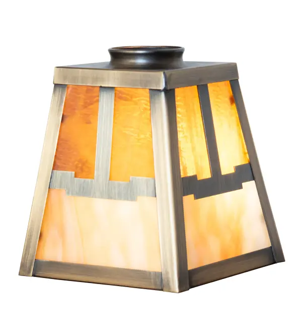 An Arts and Crafts design is featured on this shade which is designed with a Valley View motif on a shade that features Honey Amber art glass on the upper section with Beige Art Glass on the lower section. The Solid Brass shade is enhanced with an Antique Brass finish and inspired by Mission-styled homes in Santa Fe; New Mexico; and Highland Park and Santa Barbara in California. This shade features a ring and is designed to be paired with a wall sconce or ceiling pendant. The Mission Valley View Shade is included in our American-made; American-designed; handcrafted; award-winning Mission Lighting Collection and manufactured in Yorkville; NY. UL and cUL listed for dry and damp locations.