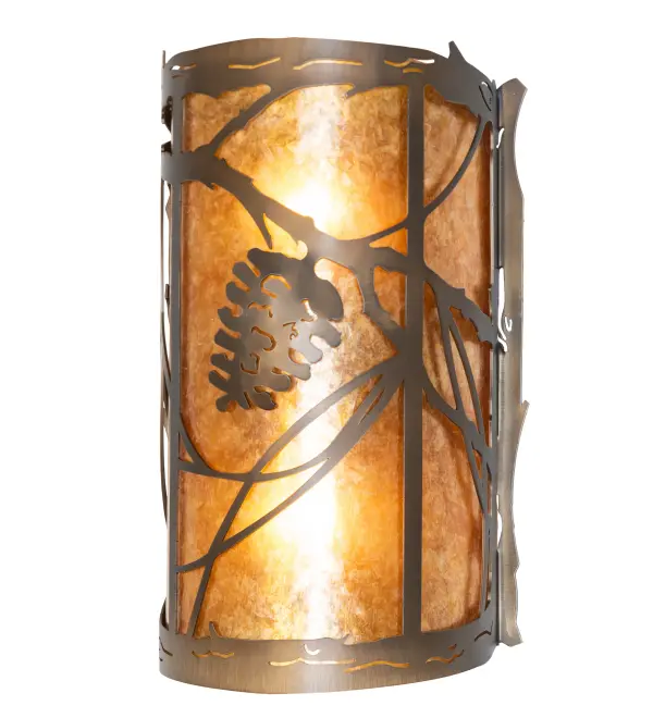 Invite the beauty of nature into your home with a charming wall fixture featuring metal accents designed as a Pinecone, Pine needles, and branches. Experience the warm beauty of an Amber Mica diffuser enhanced with an Antique Copper finish. The ADA-compliant fixture complements the matching center sconce 272362 and left sconce 261021. The Whispering Pines Wall Sconce is featured in our American-made, American-designed, handcrafted Nature Inspired Collection. It was manufactured in Yorkville, New York. It is UL and cUL listed for dry and damp locations. Collection: Whispering Pines Finish: Antique Copper Glass: Amber Mica Width: 8.00" Height: 13.00" Length: 4.00" Weight: 3.00 lb Number of Bulbs: 2 Maximum Wattage: 60.00 W Bulb Type: A19 Bulb Base: E26 Material: Steel Country of Origin: USA Safety Rating: Damp