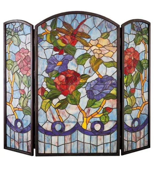 A Scarlet dragonfly darts above Beige; Merlot and Cornflower Blue blooms and buds. This beautiful fireplace screen; with Blue Sky background glass is created from 485 pieces of stained art glass and framed in solid brass channel.